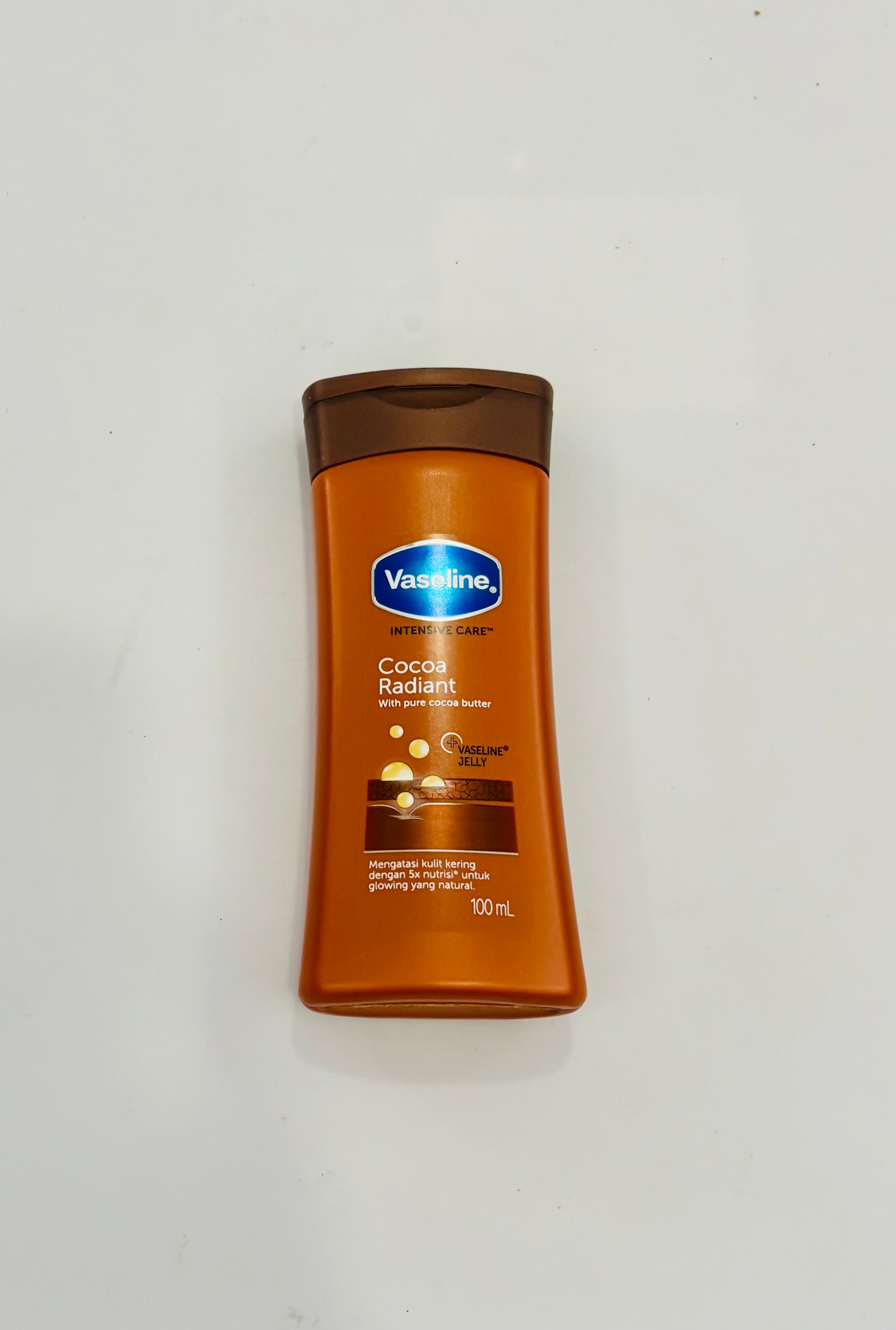 Vaseline Cocoa Radiant Lotion – 100mL Travel Size with Pure Cocoa Butter